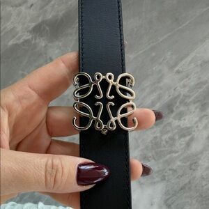 Black Leather Belt with Decorative Silver Buckle